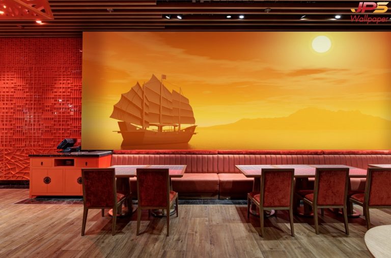 ภาพเรือสำเภาจีนกลางทะเลในยามเย็น